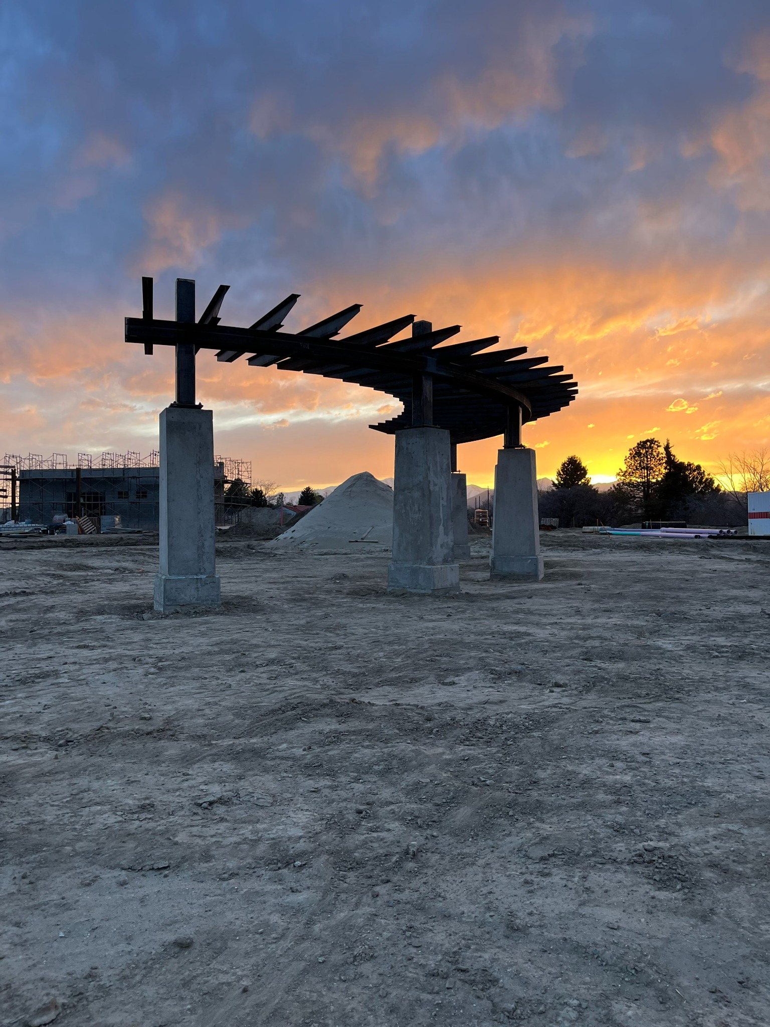 Steel canopy framing at sunset